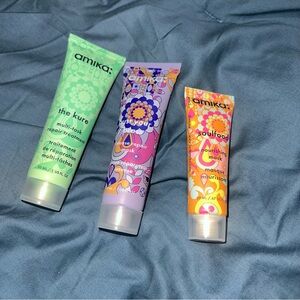 Amika Hair Care Set with Green, Purple, and Pink Packaging